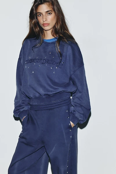 WASHED SWEATSHIRT WITH STUDS