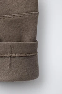 STRAIGHT PLUSH PANTS WITH RAISED LOGO