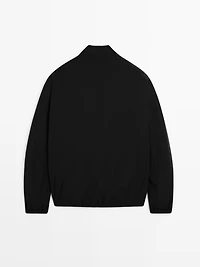 Veste réversible à col montant