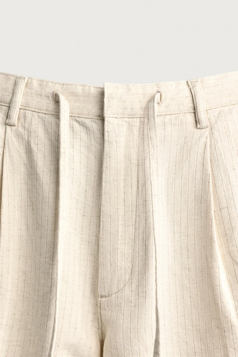 WIDE FIT STRIPED PLEATED SHORTS