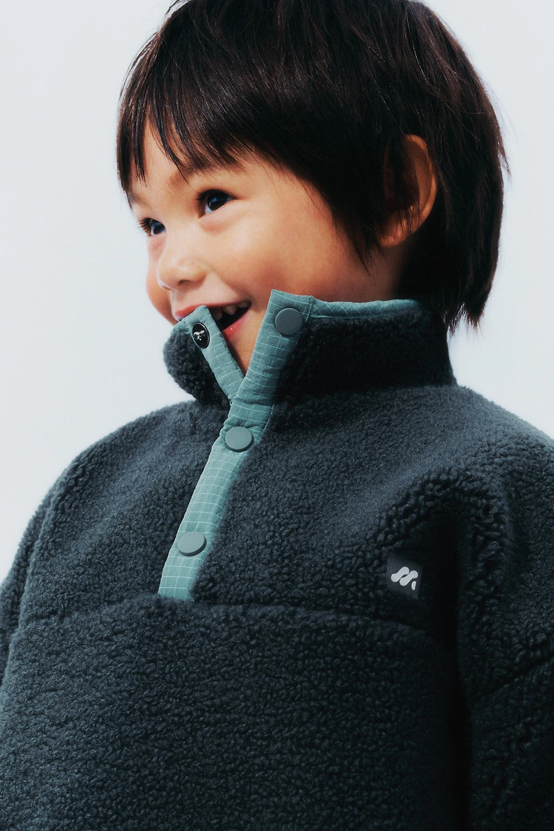 FAUX SHEARLING SWEATER WITH RUBBERIZED LOGO