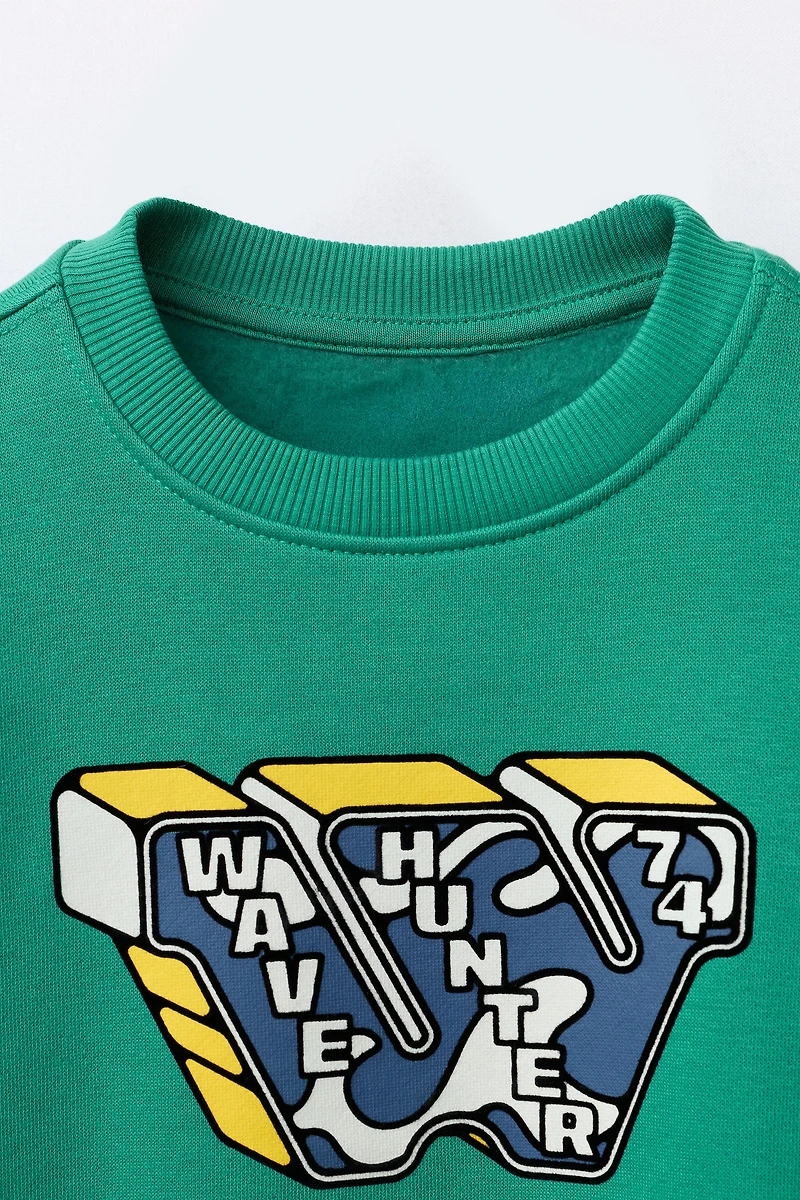 FLOCKED PRINT SWEATSHIRT