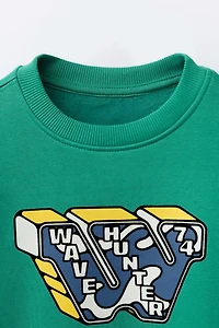 FLOCKED PRINT SWEATSHIRT