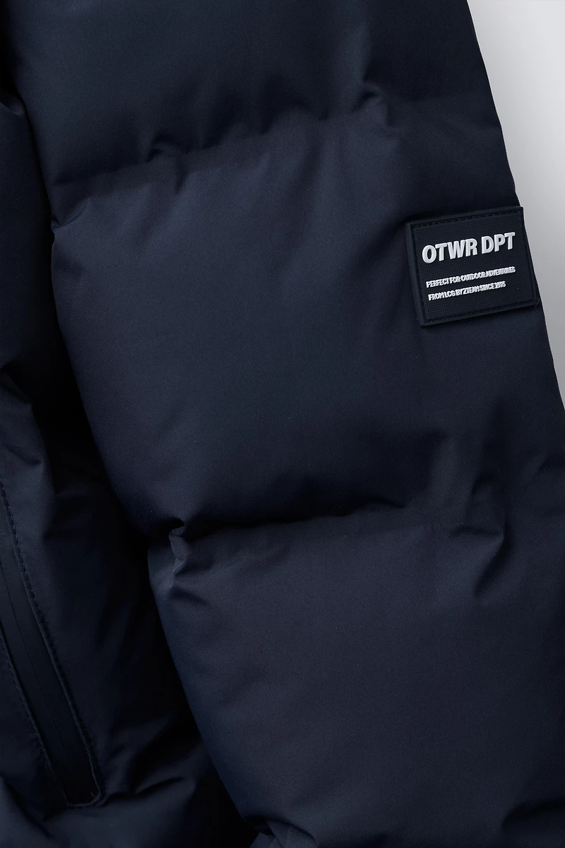 MANTEAU MATELASSÉ ÉTIQUETTE WATER REPELLENT