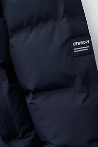 MANTEAU MATELASSÉ ÉTIQUETTE WATER REPELLENT