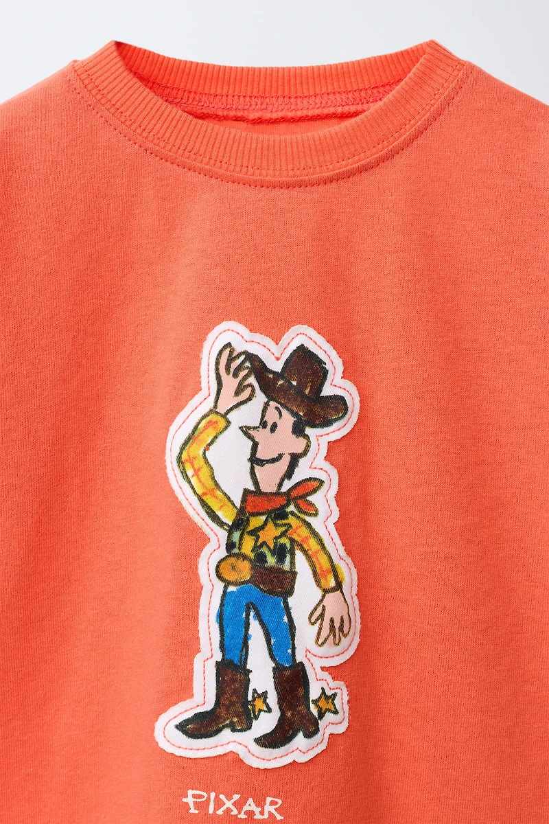 T-SHIRT PIÈCE WOODY TOY STORY © DISNEY PIXAR