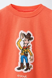 T-SHIRT PIÈCE WOODY TOY STORY © DISNEY PIXAR