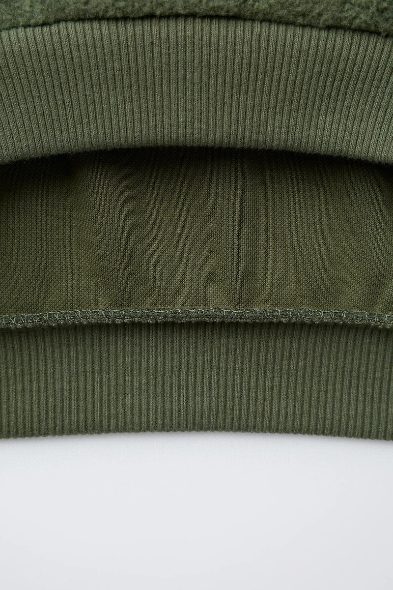 SWEAT EN FAUSSE FOURRURE MICKEY MOUSE © DISNEY