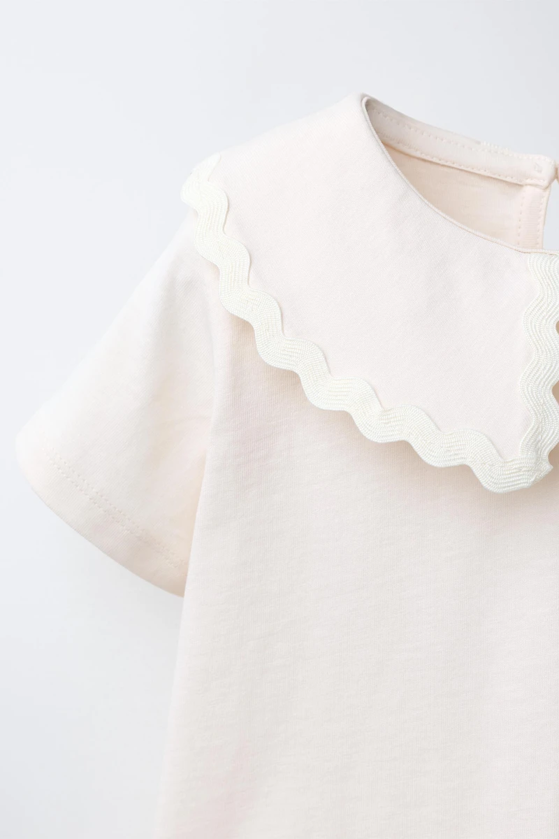 PETER PAN COLLAR TOP WITH RIPPLE TRIM