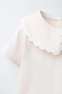 PETER PAN COLLAR TOP WITH RIPPLE TRIM