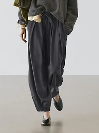 Voluminous wide-leg pleated trousers