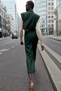 SHORT VEST WITH FLAPS
