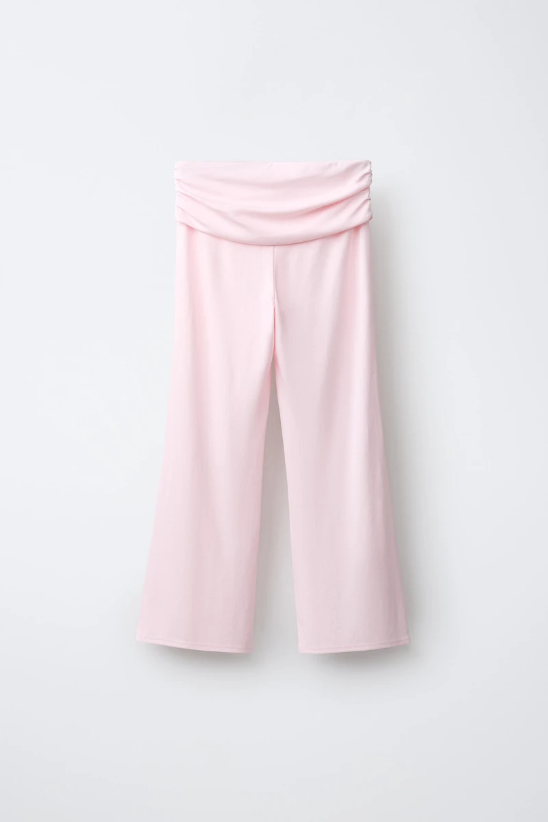 PANTALON FLARE AVEC REVERS ET PLIS