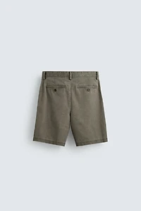 REGULAR FIT PLEATED SHORTS