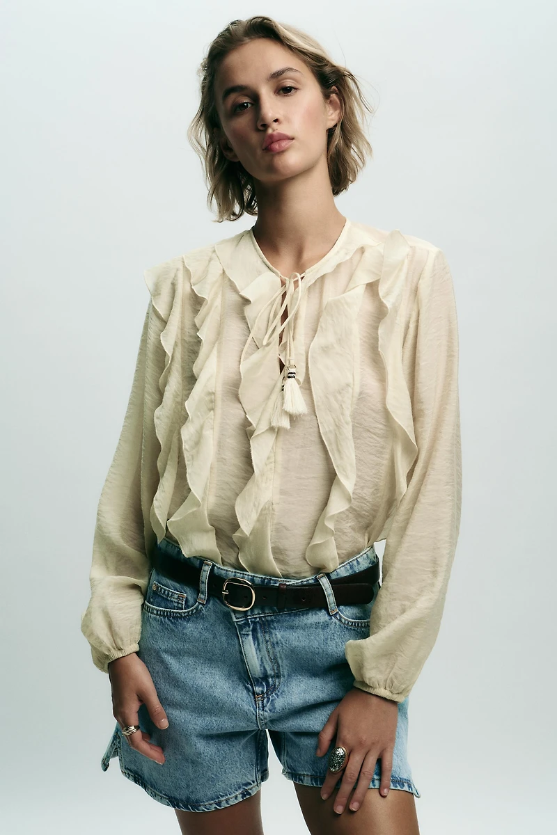 BLOUSE ROMANTIQUE À VOLANTS