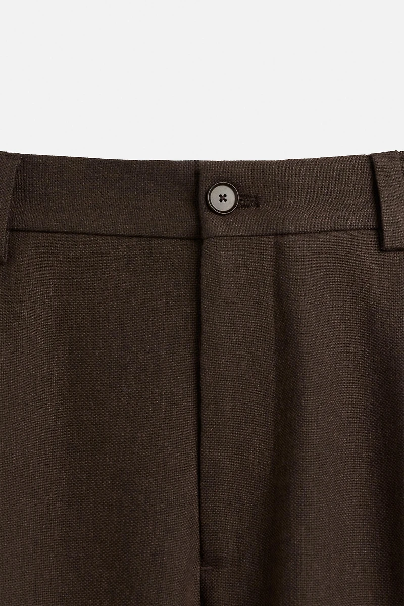 TEXTURED PLEATED SHORTS