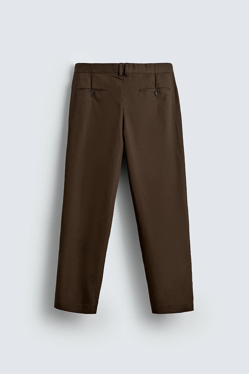 LIMITED EDITION PLEATED CHINO PANTS