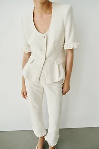VESTE PEPLUM À VOLANTS ET MANCHES COURTES