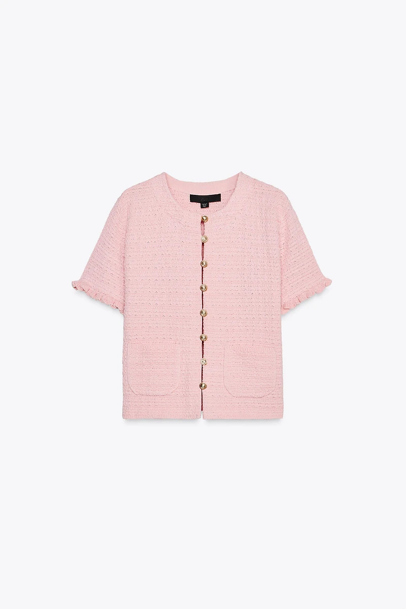 GILET EN MAILLE À VOLANTS