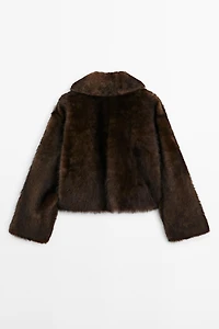 Short leather coat with fur