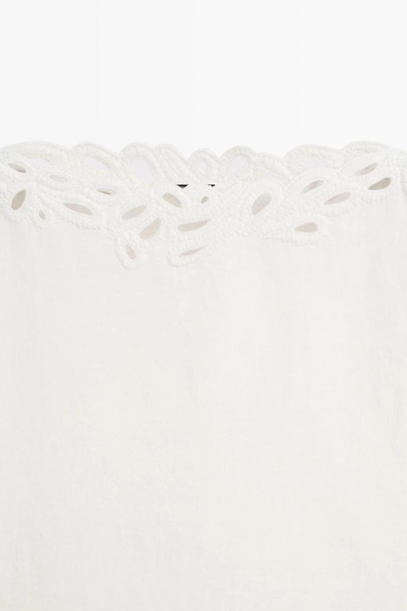 Linen boat neck blouse with embroidery