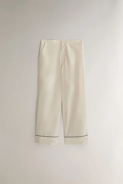 PANTS WITH BLACK PIPING