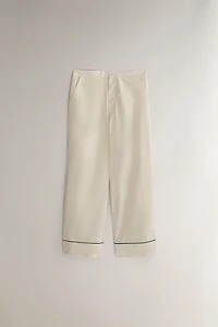 PANTS WITH BLACK PIPING