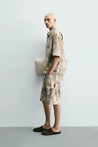 WASHED FLORAL PRINT RELAXED FIT SHORTS