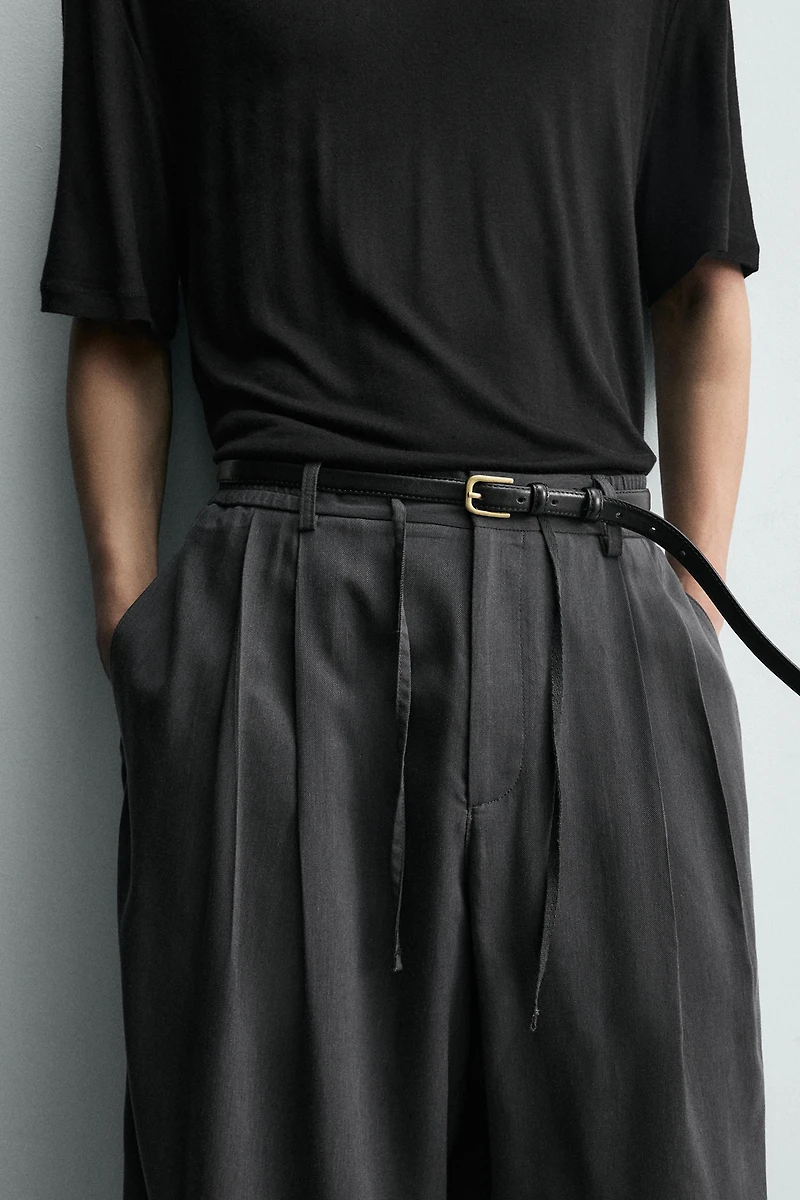 FLOWY PLEATED PANTS
