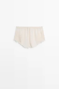 Flowing shorts with embroidered detail