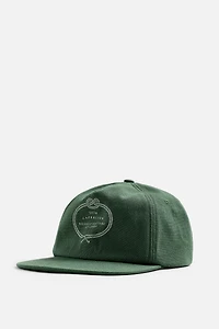 CASQUETTE DÉLAVÉE AVEC IMPRIMÉ COMBINÉ