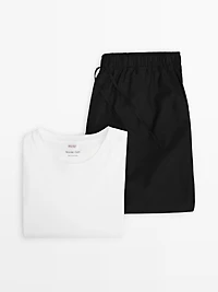 Short sleeve pyjama top and striped trousers