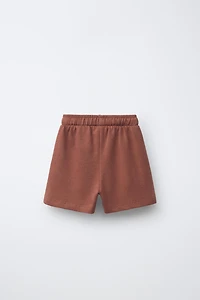 SHORT À BANDES LATÉRALES
