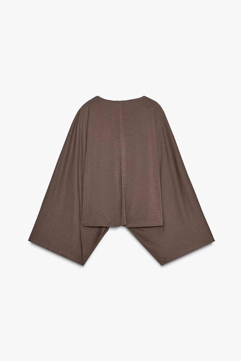 ASYMMETRIC FLOWY CAPE