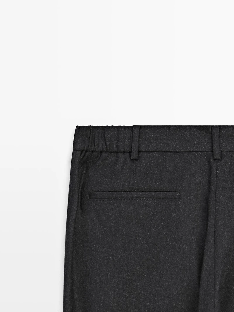 100% wool flannel trousers with elasticated side
