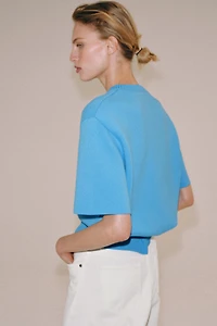 SHORT SLEEVE KNIT JUMPER WITH SHOULDER PADS