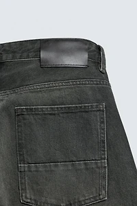 BAGGY FIT JEANS WITH TWISTED SEAM
