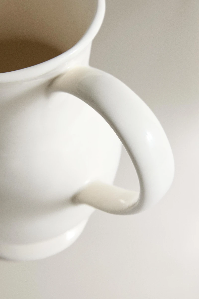CREAM DECORATIVE CERAMIC PITCHER