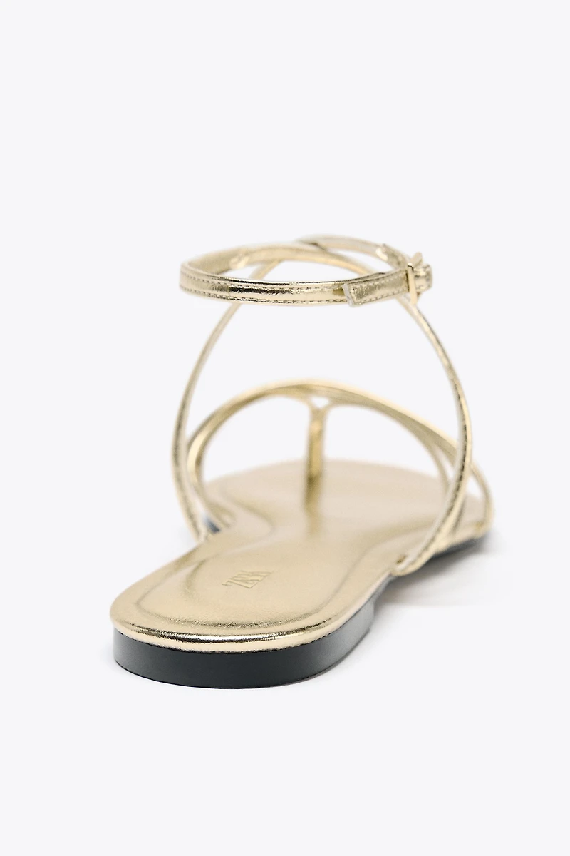 GOLD STRAPPY FLAT SANDALS