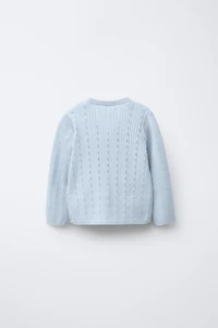 GILET EN MAILLE CROISÉ AJOURÉ