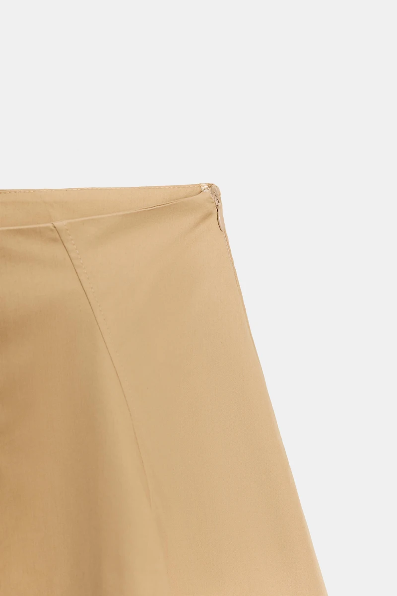 ASYMMETRICAL MINI SKIRT