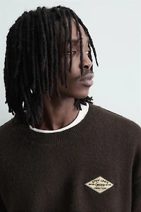 JACQUARD TEXT JUMPER