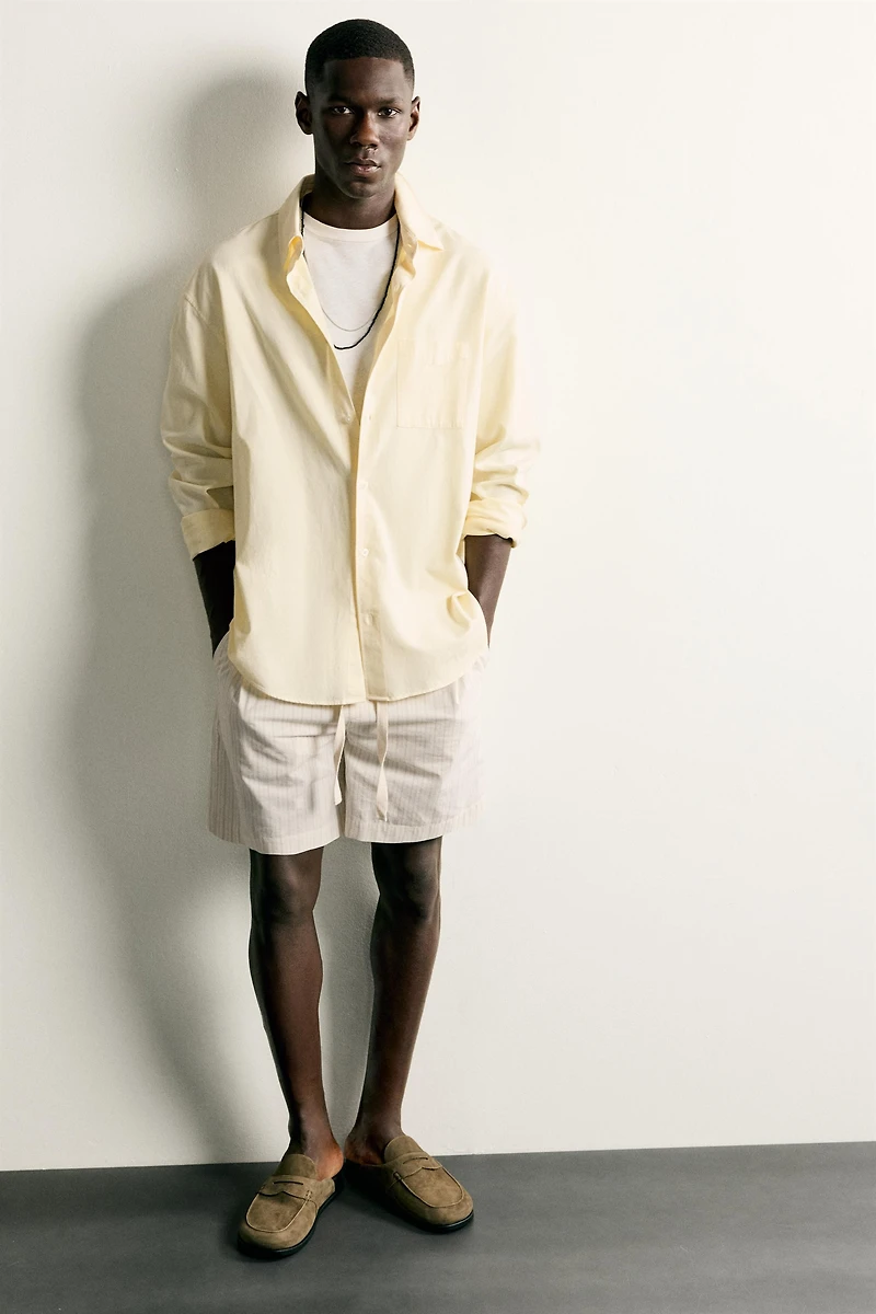SABOTS EN CUIR AVEC MASQUE