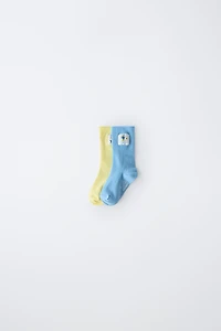 TWO-PACK OF MICKEY MOUSE AND DONALD DUCK LONG SOCKS © DISNEY