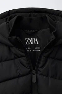 VESTE MATELASSÉE MANCHES EFFET NÉOPRÈNE