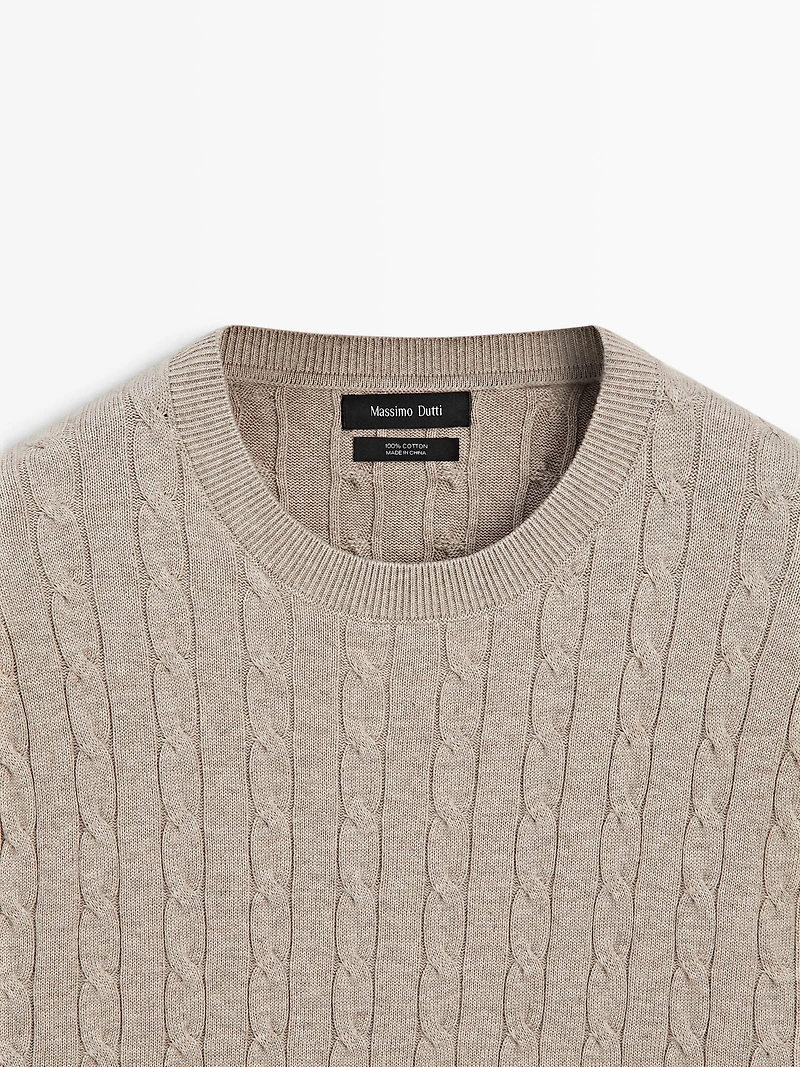 100% cotton cable-knit sweater