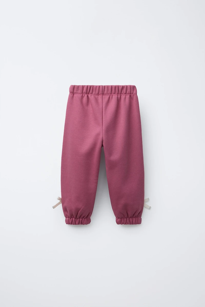 PANTALON JOGGER BANDE LATÉRALE NŒUD