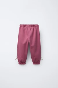 PANTALON JOGGER BANDE LATÉRALE NŒUD
