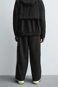 TECHNICAL PANTS WITH STRIPES