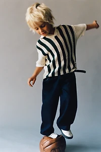 STRIPED KNIT POLO SHIRT